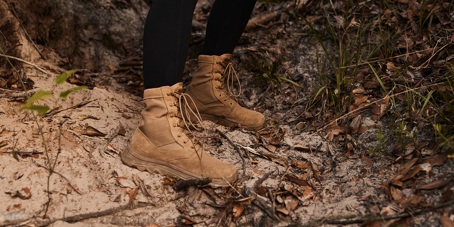 GORUCK AR 670-1 compliant tan rucking boots on person outdoors in dirt and foliage