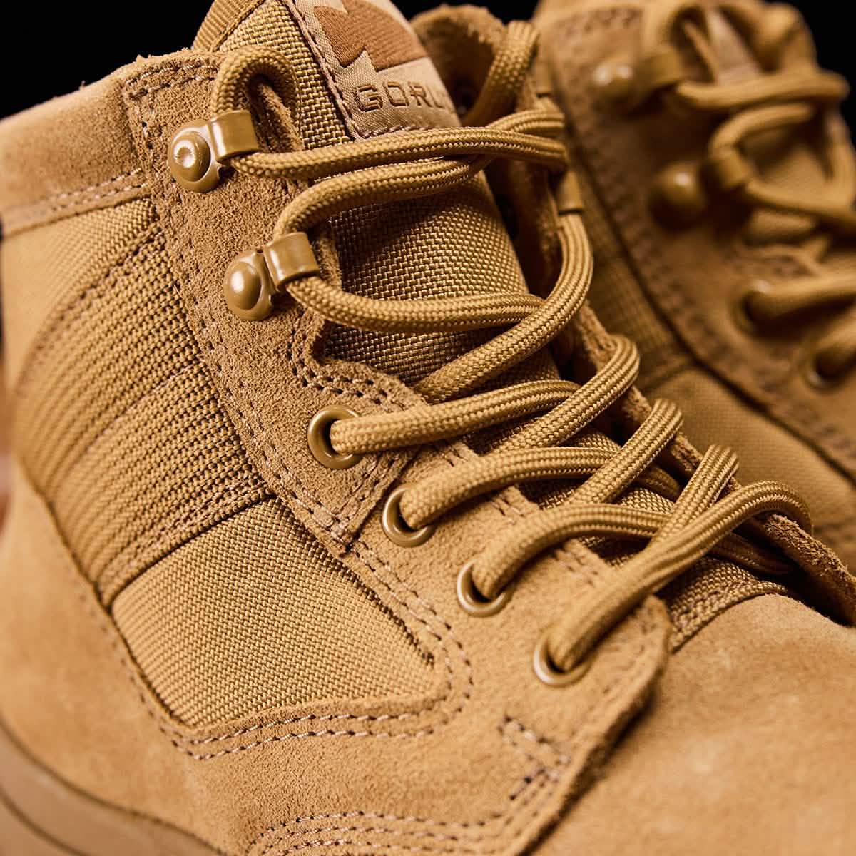 Close-up of GORUCK tan rucking boots with rugged suede and nylon details