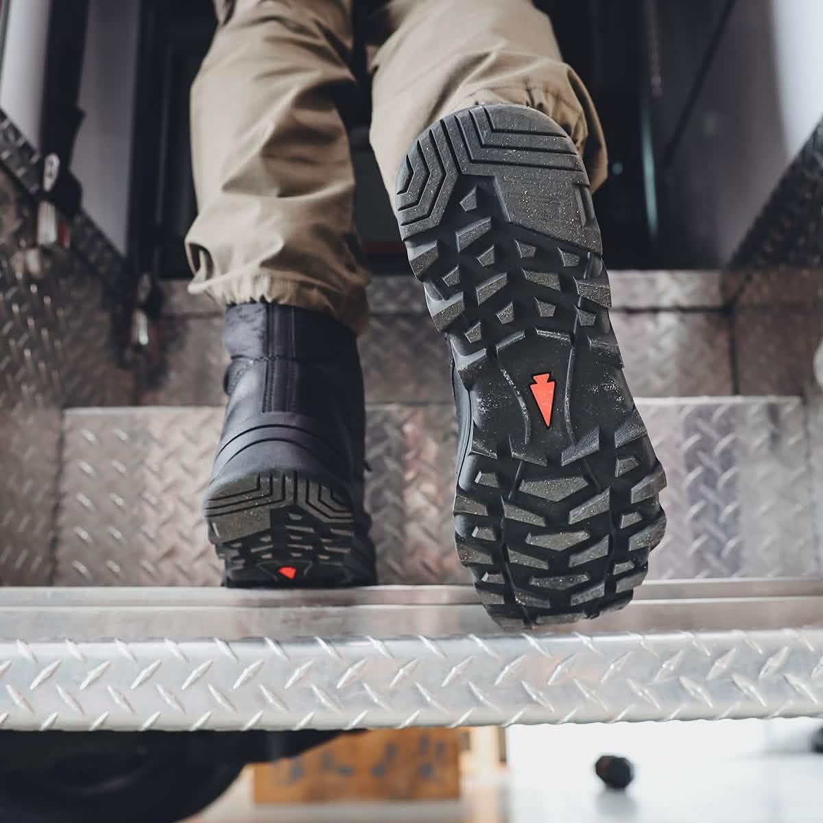GORUCK rucking boots with rugged tread, close-up on diamond plate steps