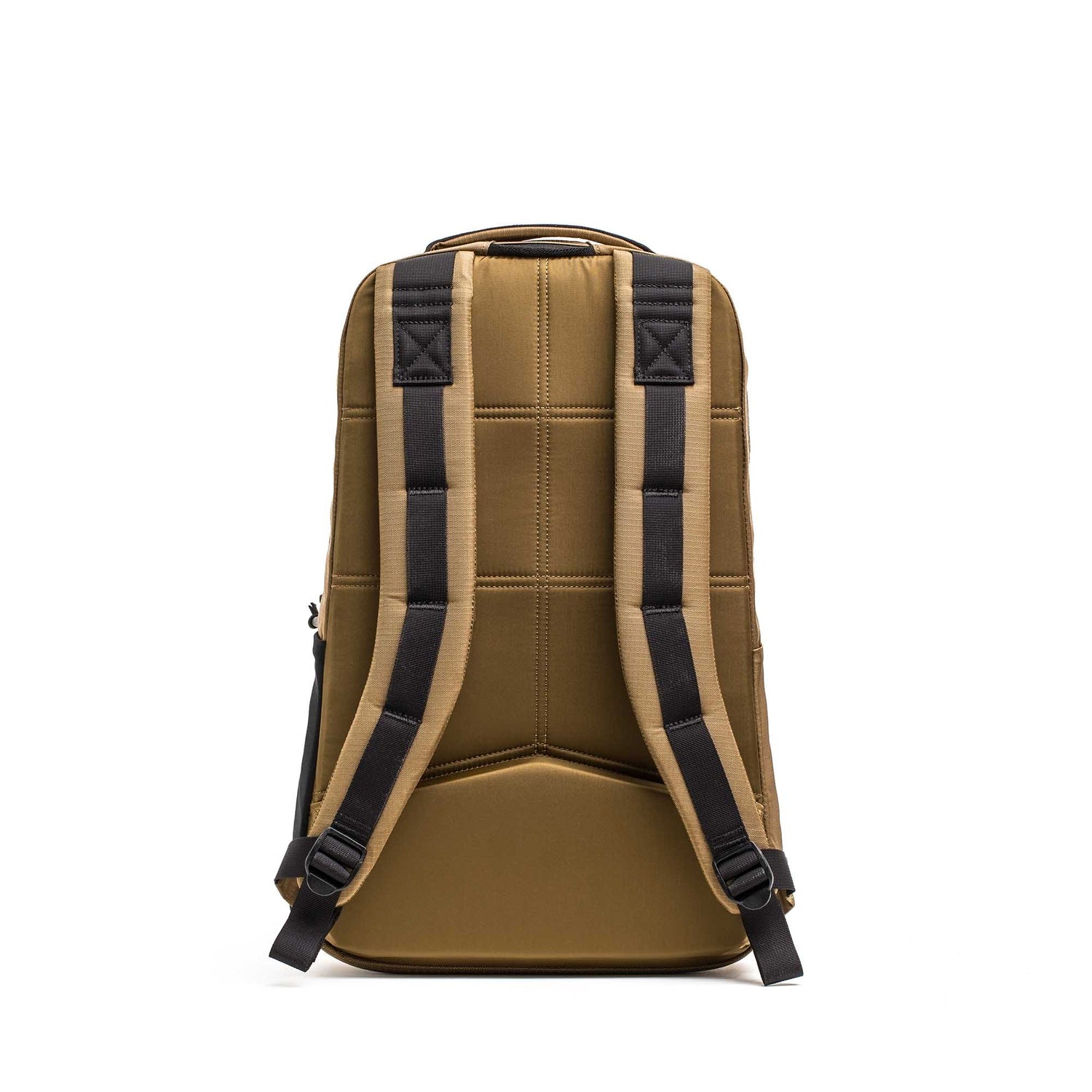 A tan Basic Rucker® backpack shown from the back, featuring padded black straps and a top handle on a white background.