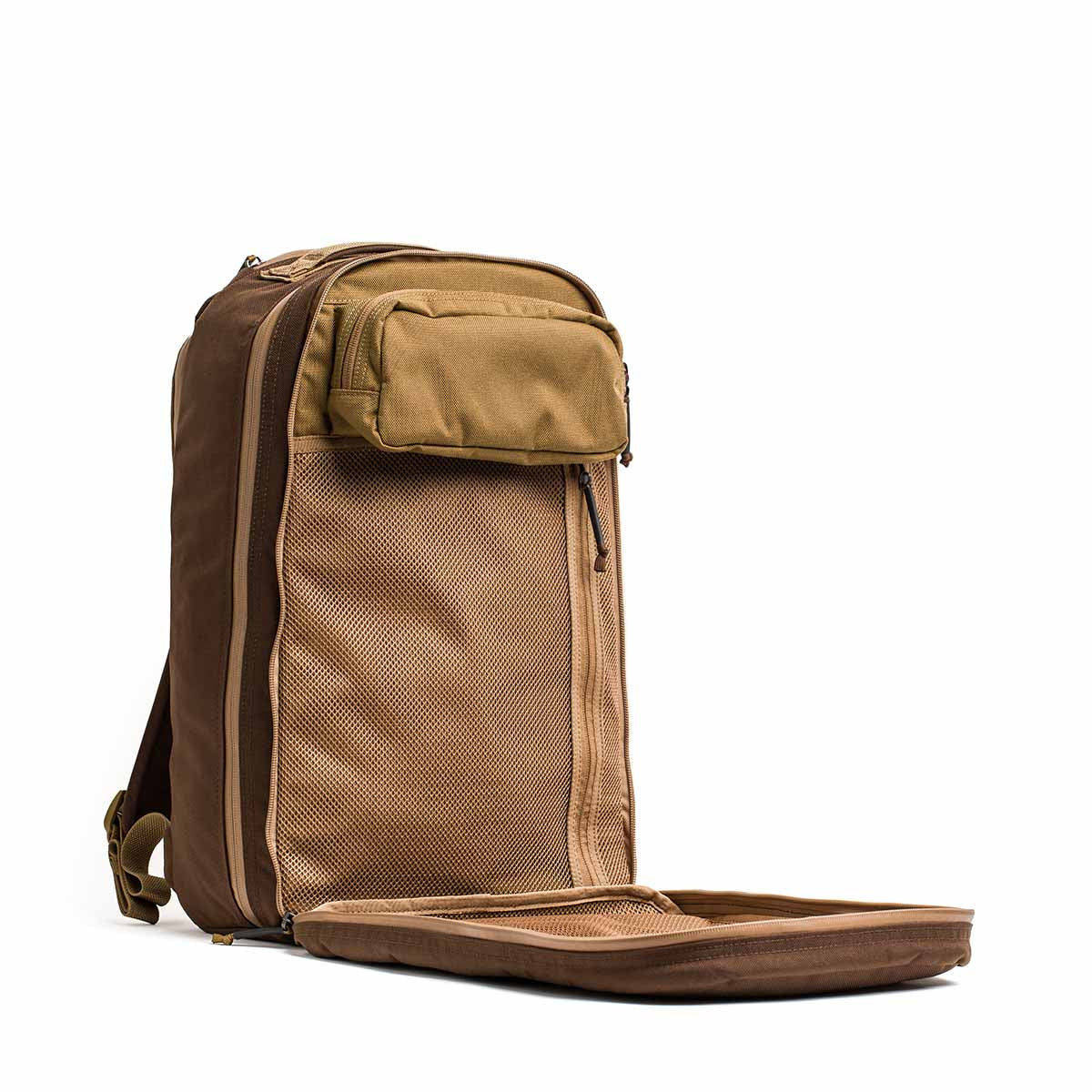 The Double Bullet Ruck w/ Bombproof Laptop Compartment - 18L stands upright in brown and tan, its front compartment unzipped to reveal mesh pockets and a secure laptop section.