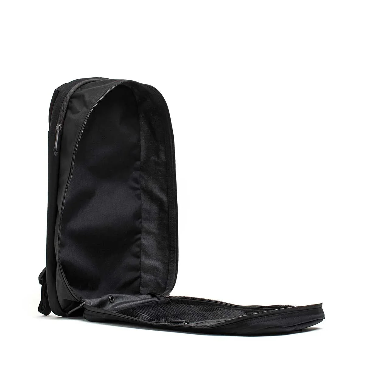 GORUCK Bullet Ruck 15L black backpack open, showing spacious main compartment