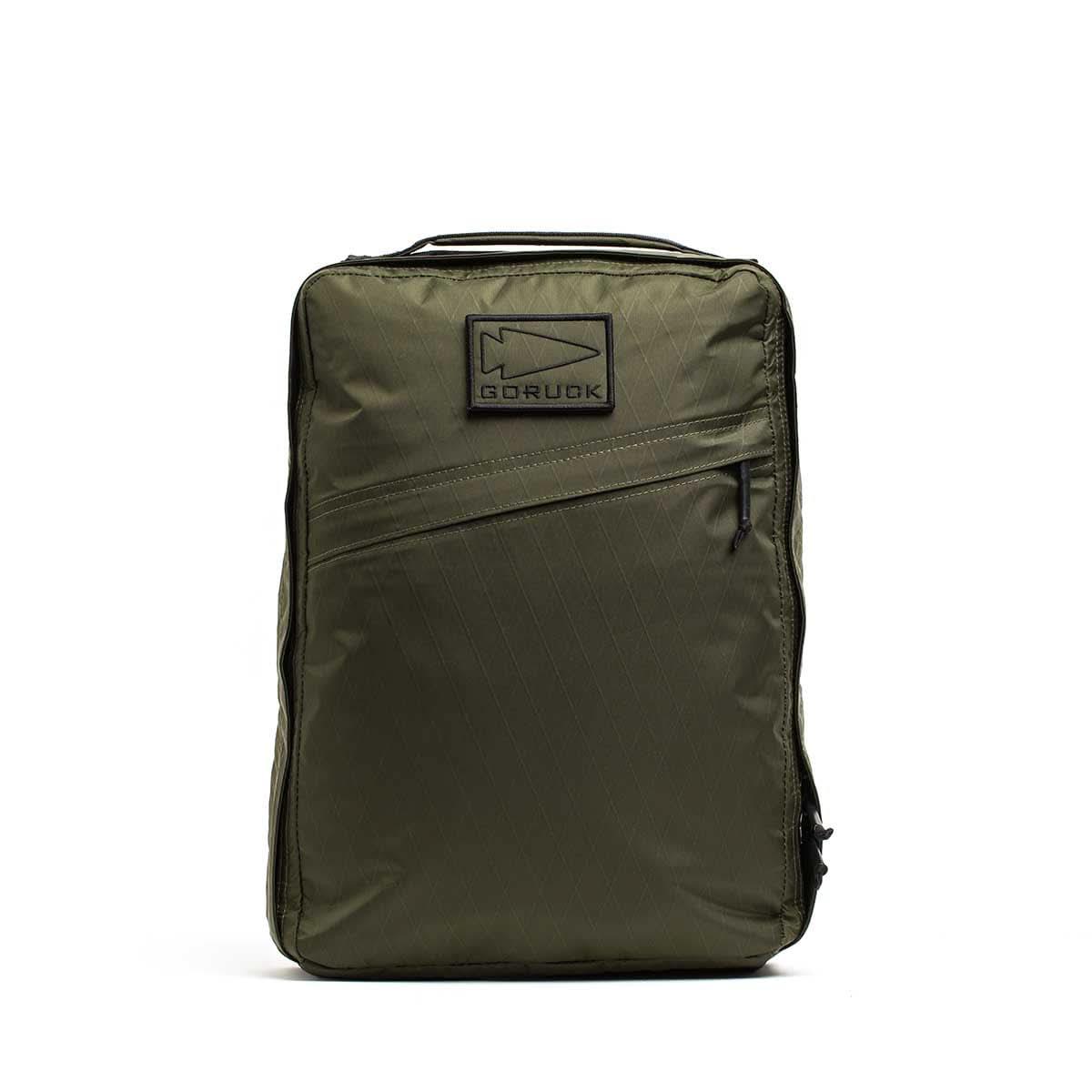 GORUCK dark green XPAC rucksack with logo patch, angled front zipper, minimalist design