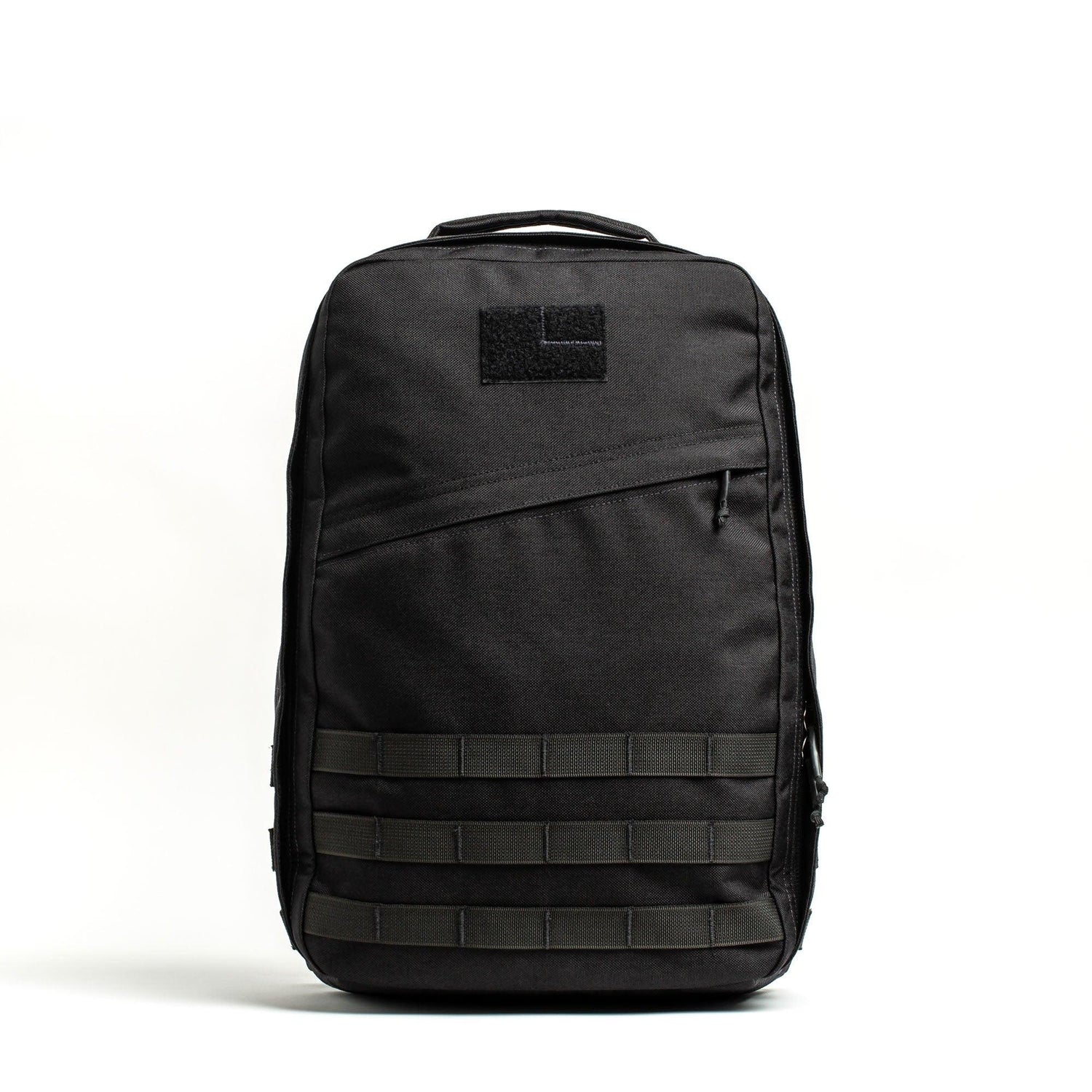 GORUCK GR1 21L black rucksack with MOLLE webbing, shown on white background