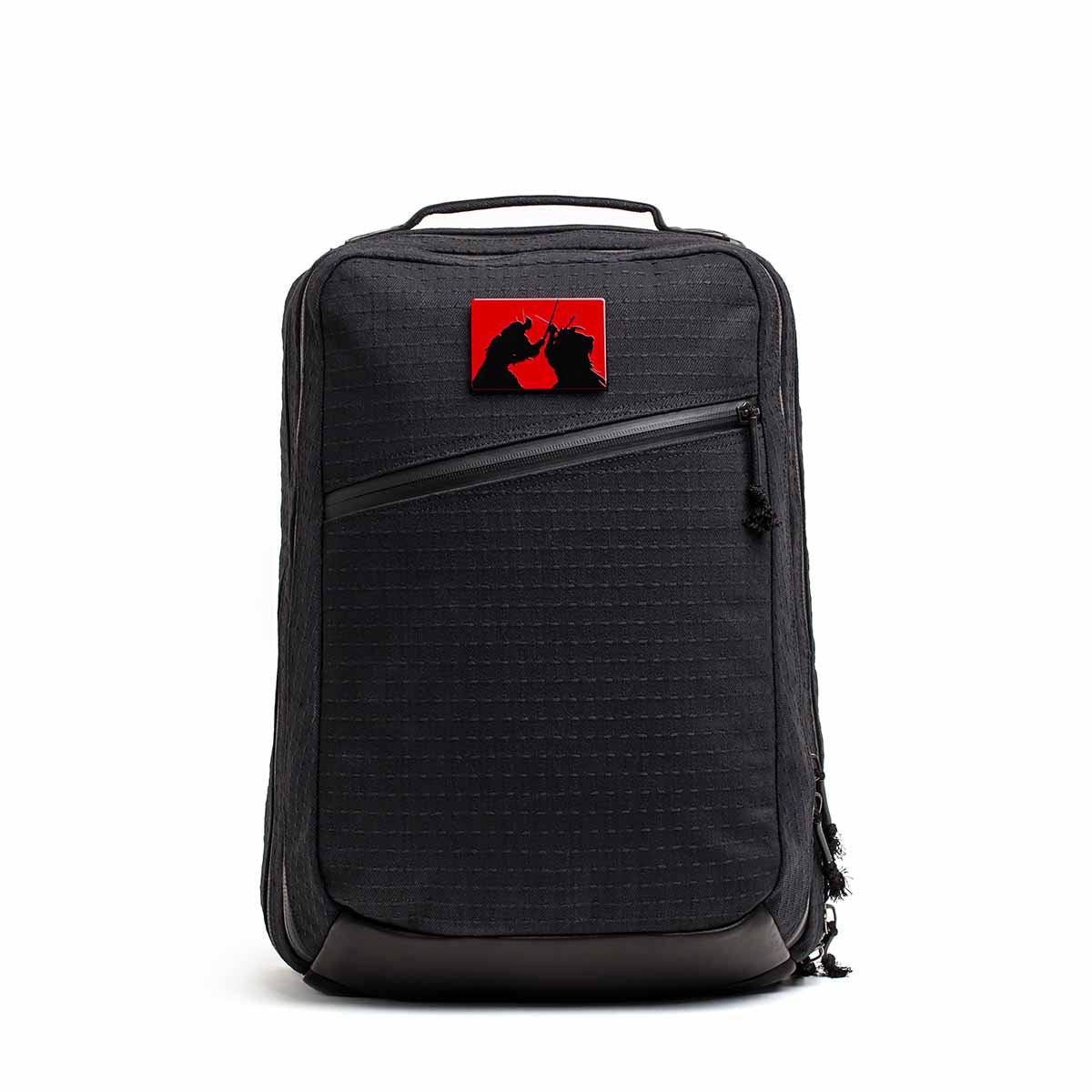 GORUCK black rucksack with red samurai patch, durable and tactical gear for rucking