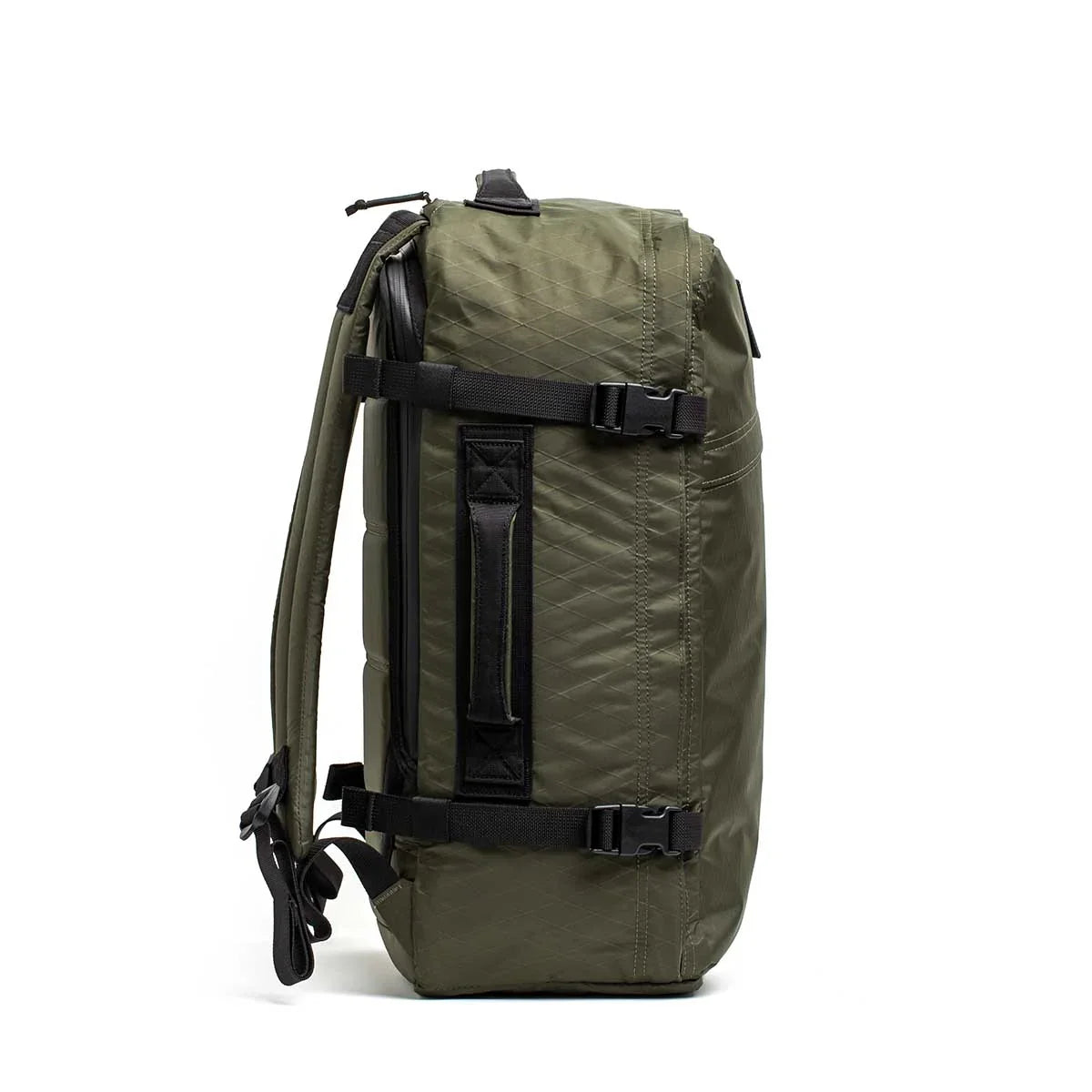 GORUCK dark green XPAC rucksack side view with black straps and rugged handle