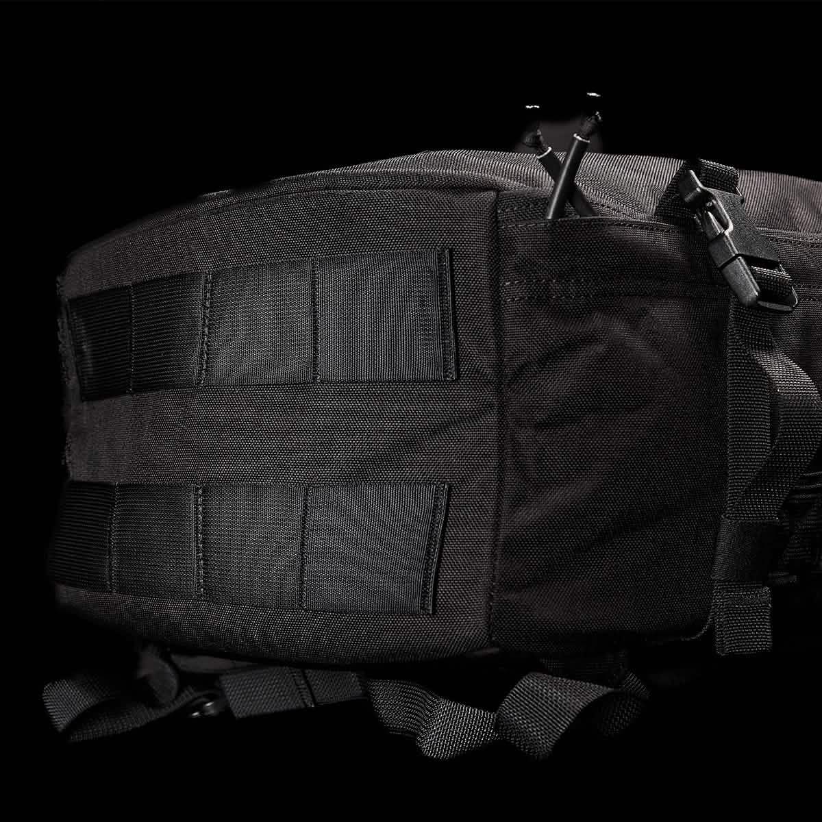 GORUCK black rucksack close-up showing rugged MOLLE webbing and durable straps