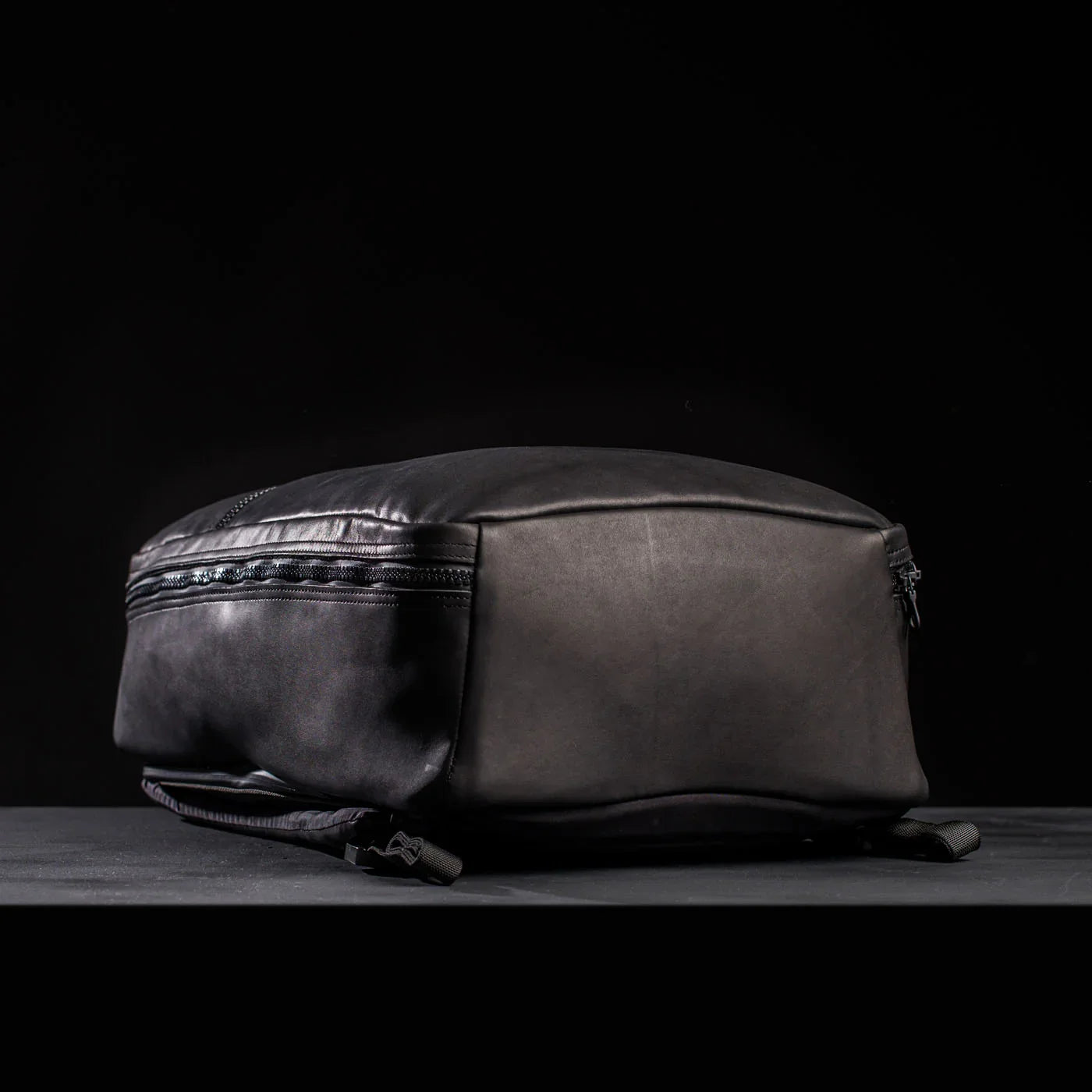 GORUCK black backpack shown flat on a dark surface, durable rucking gear design