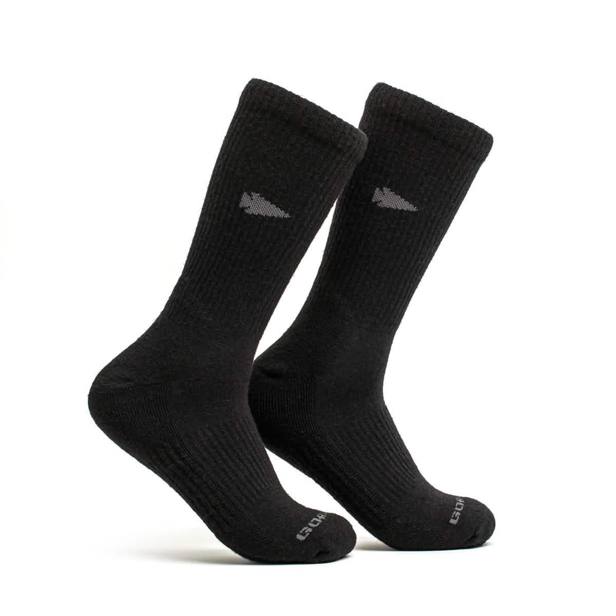 GORUCK black merino wool long crew socks with logo, durable rucking gear on white background