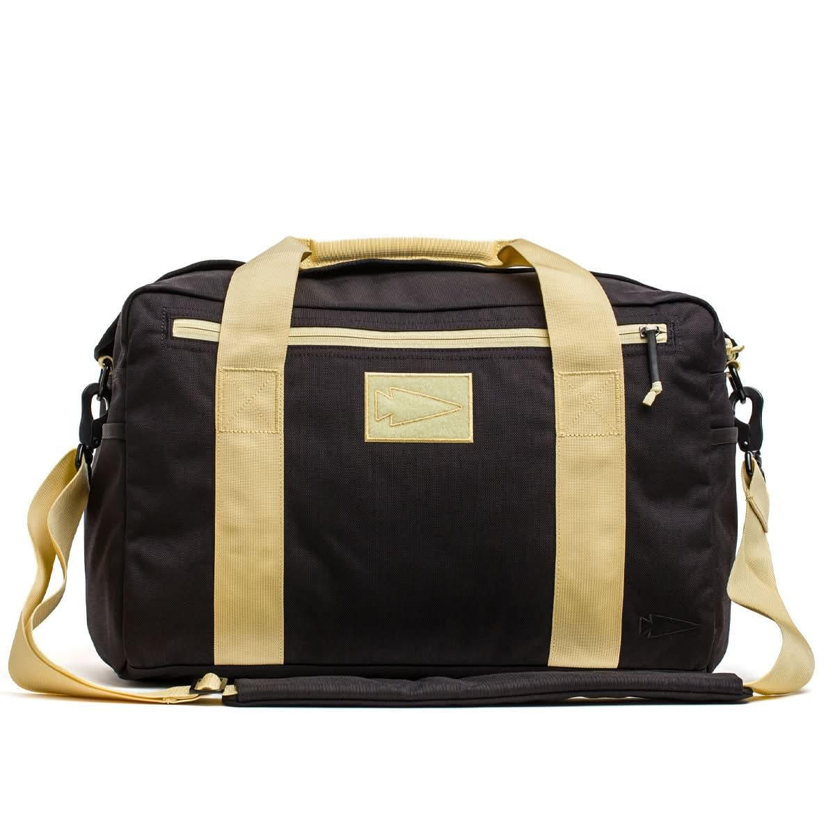 GORUCK black and gold duffle bag with arrowhead patch, durable rucking gear