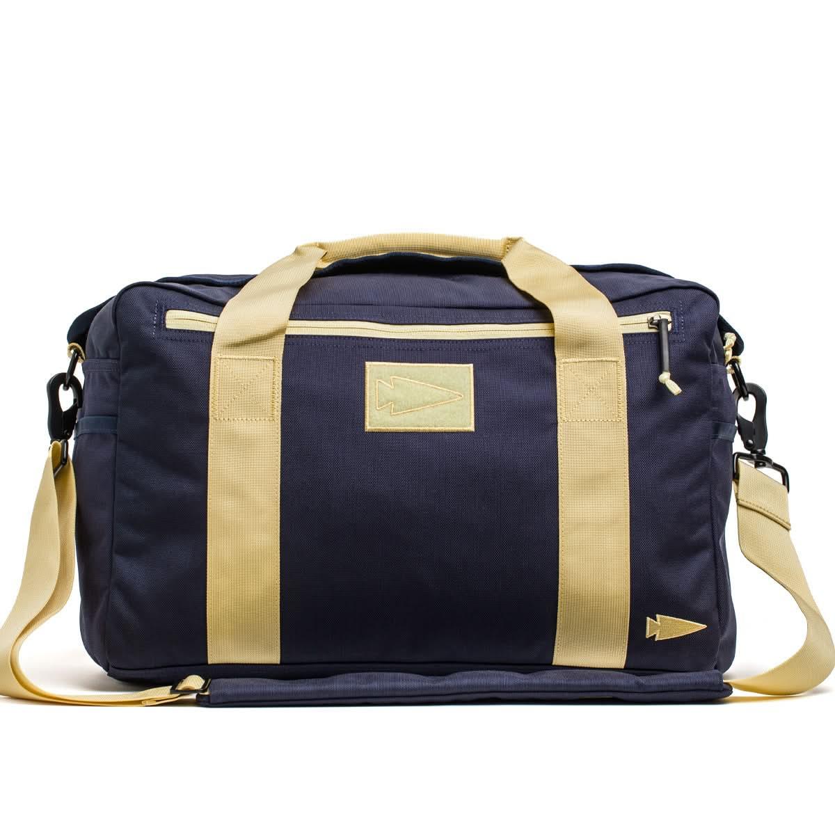 GORUCK navy and gold Lead Kit Bag with arrowhead patch and tan straps