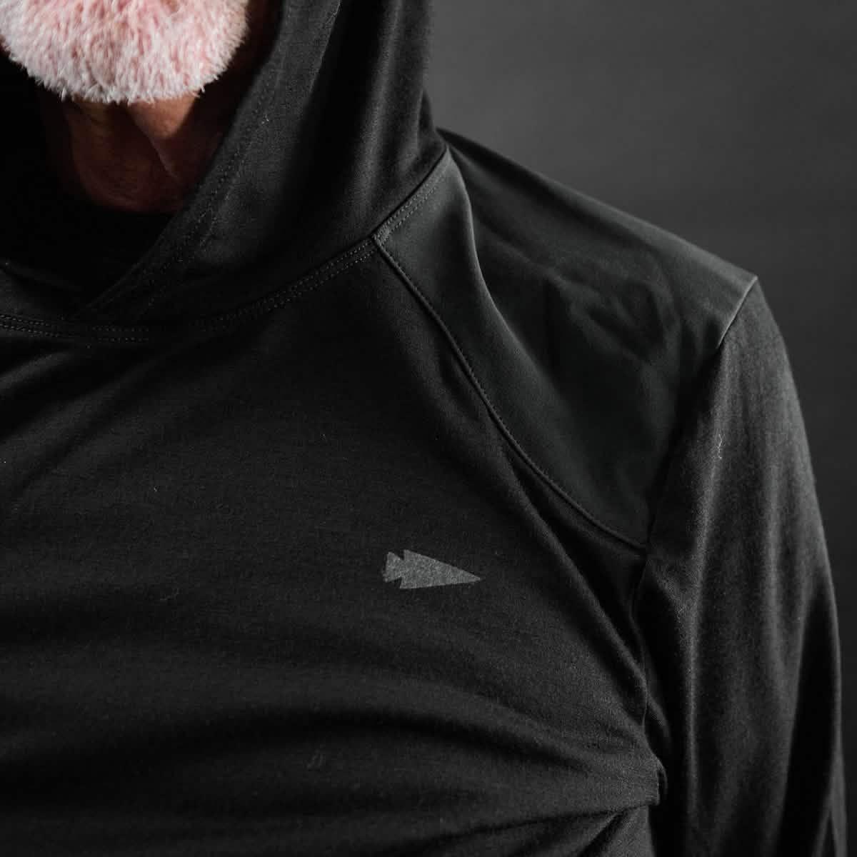 GORUCK black hoodie with arrowhead logo, close-up chest view, rucking apparel