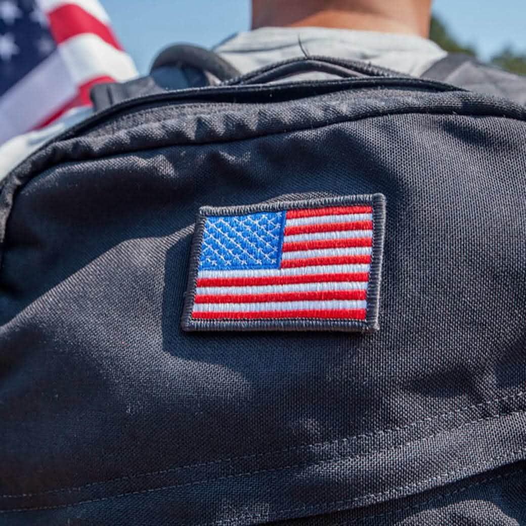 GORUCK backpack with American flag patch, rucking gear outdoors
