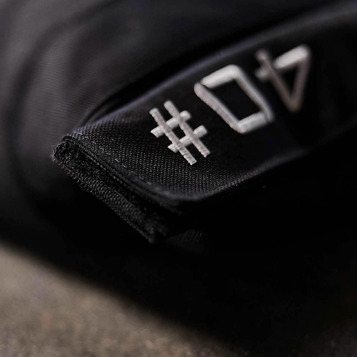 Close-up of GORUCK black ruck weight bag with stitched #40 label for rucking gear