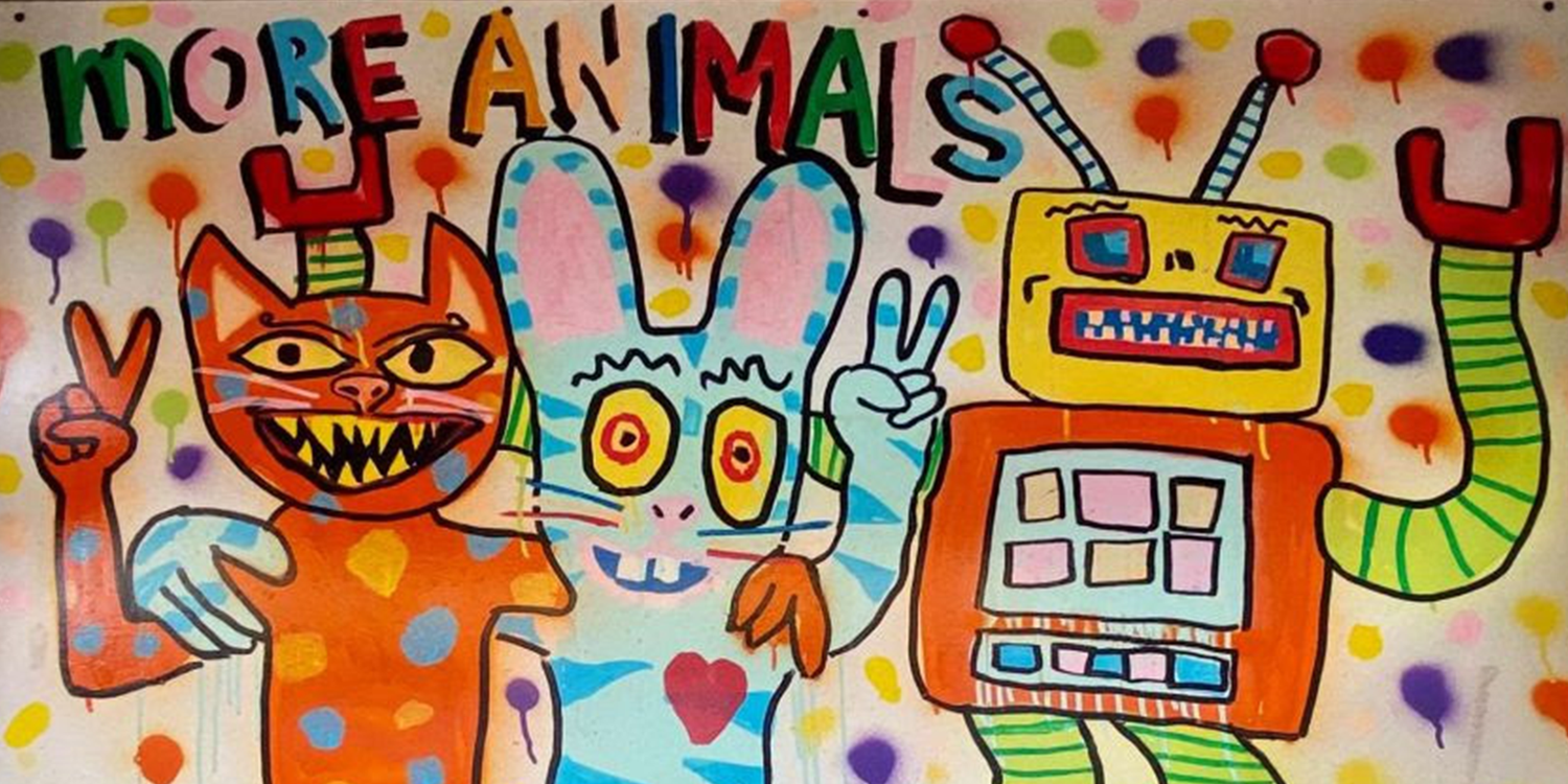 Colorful graffiti mural with cartoon cat, rabbit, and robot, 'MORE ANIMALS' text, polka dot background