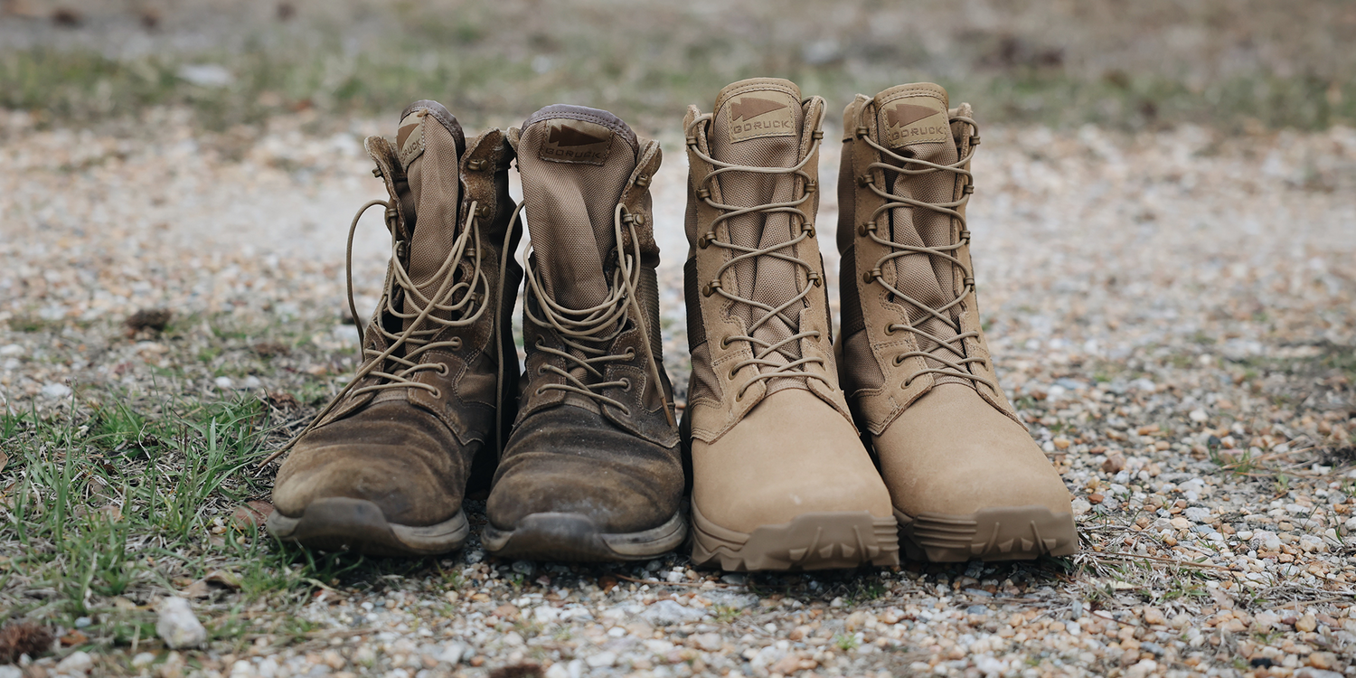 GORUCK rucking boots comparison: worn pair beside new tan boots on gravel outdoors