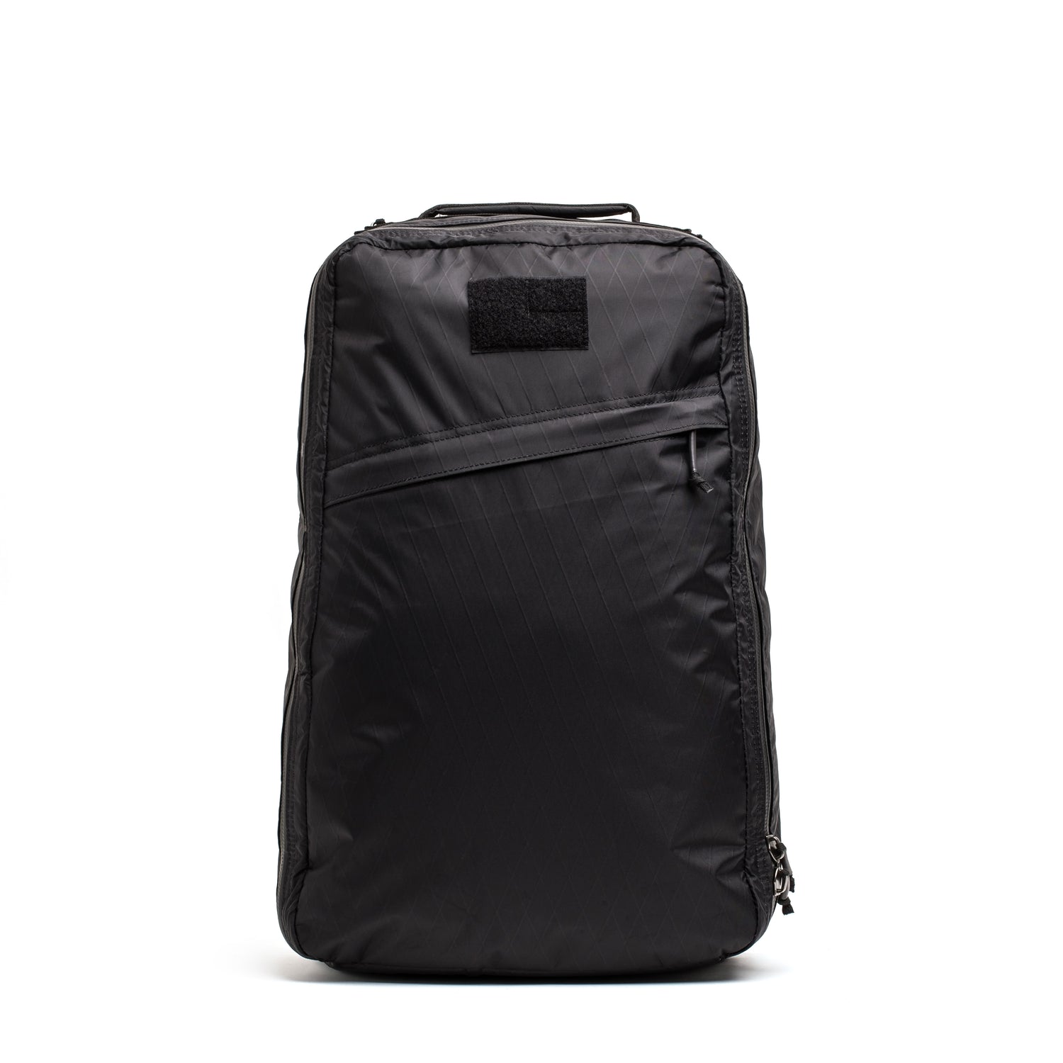 The GR1 USA - Waterproof X-PAC is a black rucksack featuring a front diagonal zipper pocket, shown upright against a white background—ideal durable gear for everyday adventures.