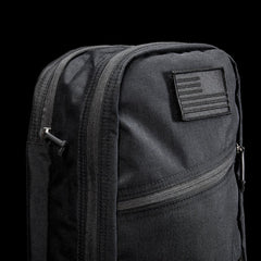 GORUCK black 15L bullet ruck backpack with two compartments and American flag patch
