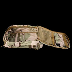 GORUCK camo rucksack open to show spacious main compartment and internal mesh pockets