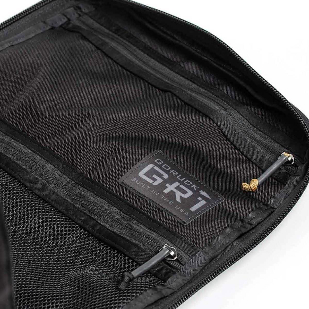 GORUCK GR1 backpack interior showing durable black mesh and zippered pockets