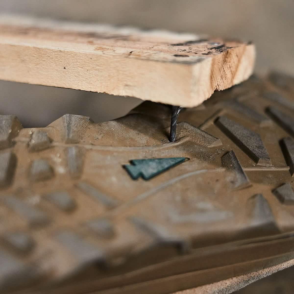 GORUCK boot outsole puncture test with wooden plank and nail, rugged rucking footwear durability