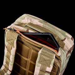 GORUCK 26L GR1 rucksack in camouflage with quick-access pocket and phone partially inside