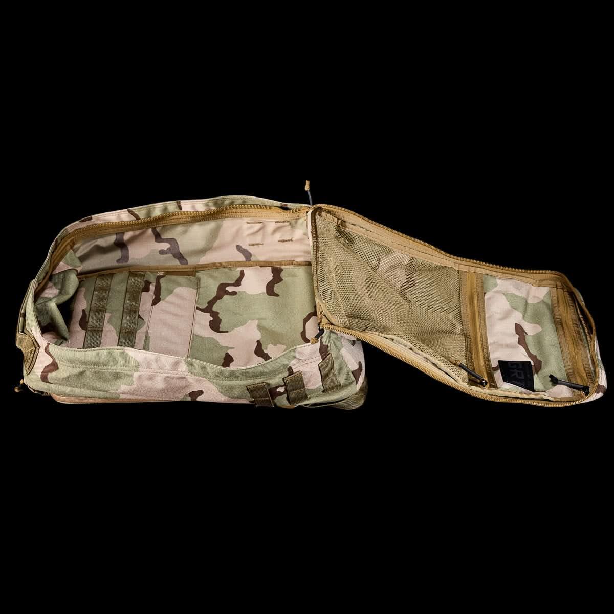 Open GORUCK 26L GR1 rucksack in desert camo, showing spacious interior and mesh pockets