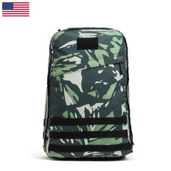 The GR1 USA - Cordura (The Original Ruck) is a camouflage backpack made from Special Forces grade materials. It features black straps and an American flag icon on a white background, ideal for GORUCK Challenges or sporting the iconic GR1 design.