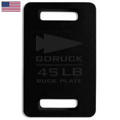 GORUCK 45 LB ruck plate, black metal weight with handles and arrow logo, American flag in corner