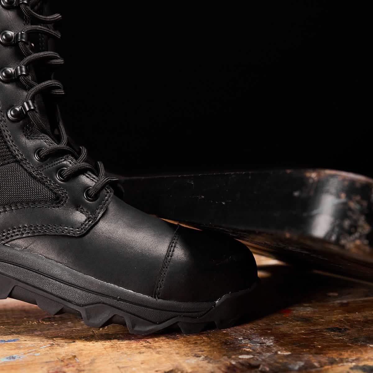 GORUCK black rucking boot with durable sole on wooden surface, tough footwear design