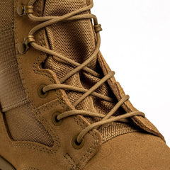 Close-up of tan GORUCK rucking boot with durable nylon and suede, tactical laces visible
