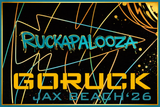 Bold, colorful text reads: "Ruckapalooza Jax Beach - Fitness Party & City Ruck Weekend '26" with dynamic abstract lines and splashes, reflecting the vibrant energy of this community fitness event.