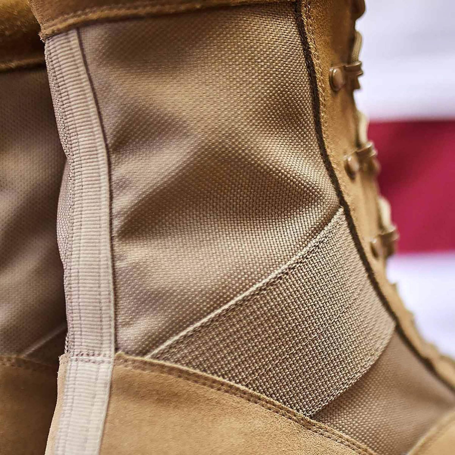 Close-up of GORUCK tan rucking boot with durable fabric and rugged stitching details.