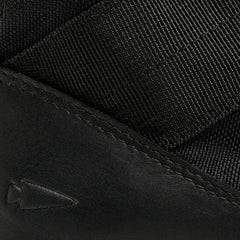 Close-up of GORUCK rucking shoe with black leather and nylon material, arrowhead logo detail