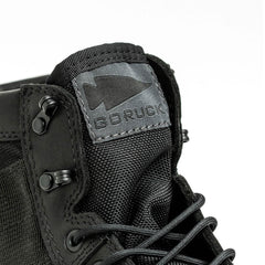 Close-up of GORUCK black rucking boot with arrowhead logo on the tongue