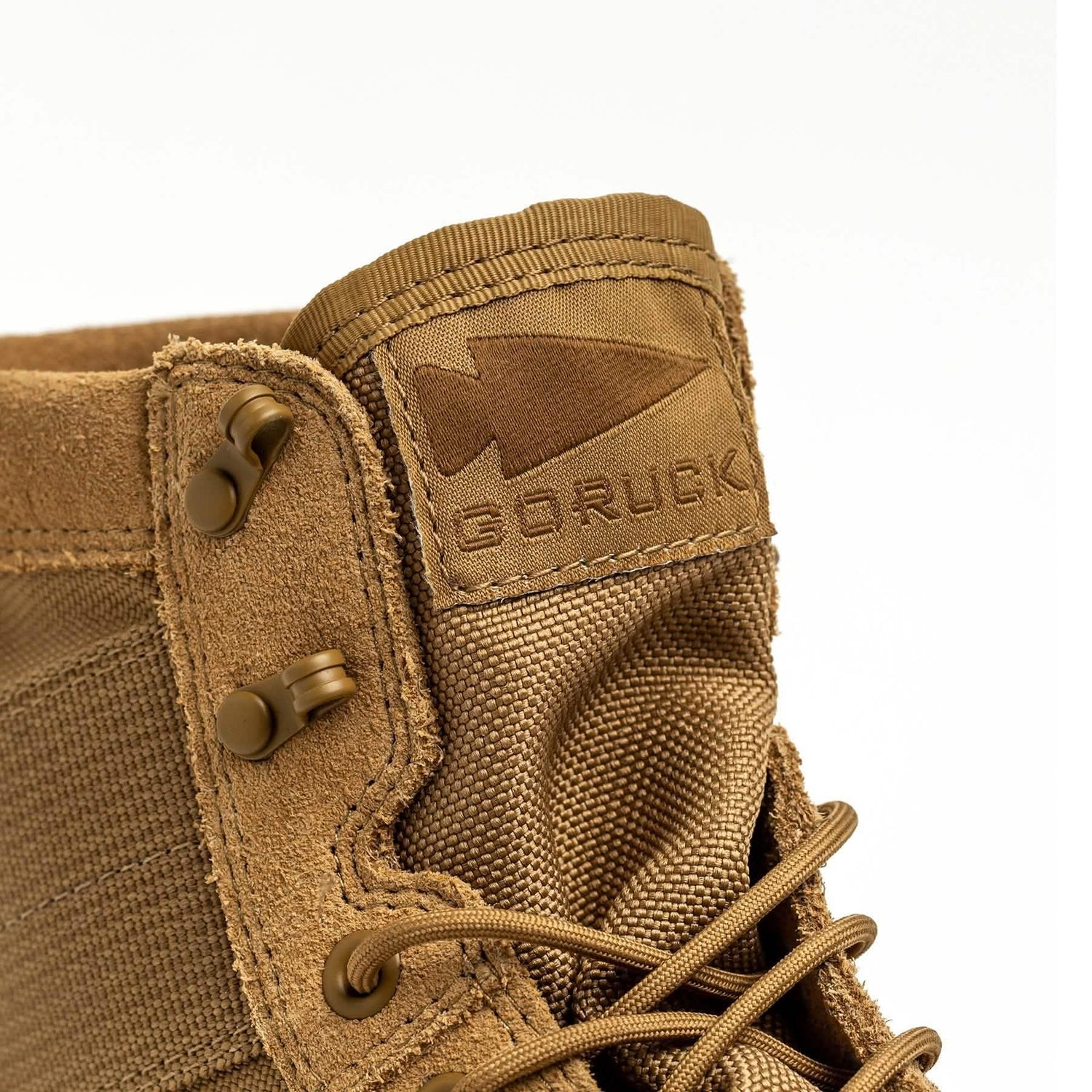 GORUCK tan rucking boot close-up, rugged nylon and suede with branded patch
