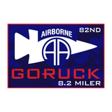 Blue and red patch for the ANTI-VIRTUAL 8.2 MILER FOR D-DAY with "82nd Airborne," "GORUCK," "8.2 Miler" text, military symbols, and support for Ruck for the Fallen and GWOT Memorial Foundation.