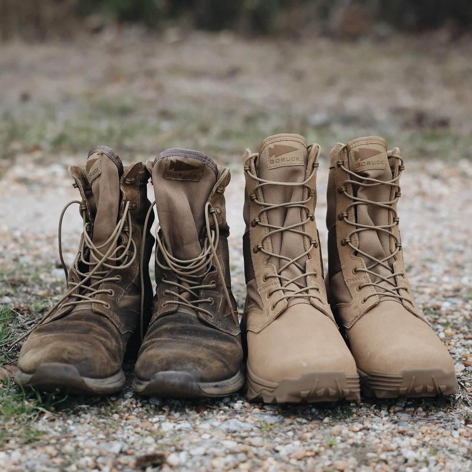 GORUCK rucking boots before and after, old worn pair next to new tan pair on gravel outdoors