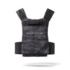 The Achilles Vest is a black GORUCK men’s vest with a camouflage pattern, built for rugged performance and shown on a white background.