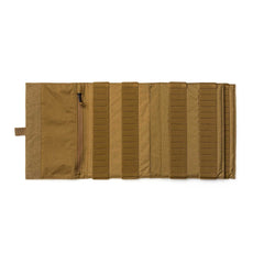The Ammo Book is a tan tactical roll-up pouch with elastic straps and a zippered pocket, laid flat and open for book-style organization and easy access.
