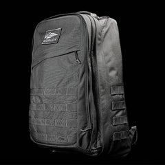 GORUCK Armor Grey tactical rucksack with patch, MOLLE webbing, rugged design on black background