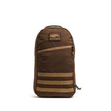 The Bullet Ruck Classic - Ballistic Nylon Cordura is a brown 15L daypack with a front zipper pocket, patch logo, and bottom horizontal webbing—ideal as a streamlined backpack or rugged rucking pack.