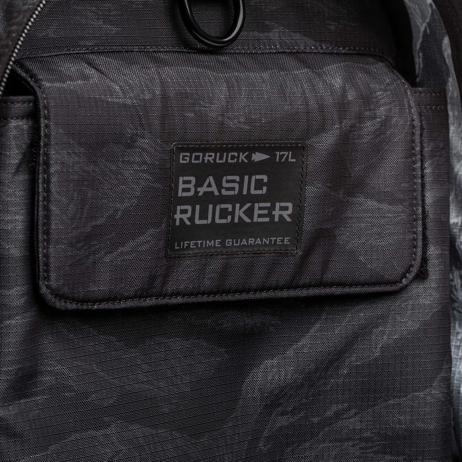 Close-up of a black Basic Rucker backpack with 
