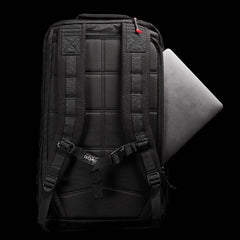 GORUCK black backpack with padded straps, laptop compartment, and rugged design on black background