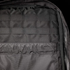 Close-up of the GR0 - Ripstop ROBIC® rucksack interior, showcasing MOLLE webbing and a zippered compartment—perfect for minimalist everyday carry or anyone seeking a water-resistant backpack.