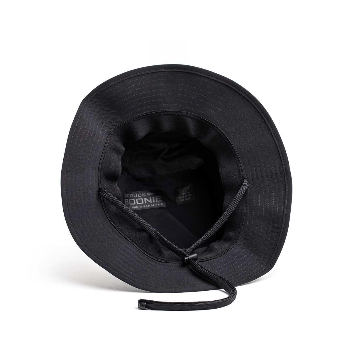 GORUCK black Boonie hat with adjustable chin strap, viewed from above on white background