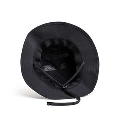 GORUCK black Boonie hat with adjustable chin strap, viewed from above on white background