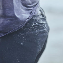 Close-up of wet GORUCK rucking shorts with water droplets, outdoor active gear