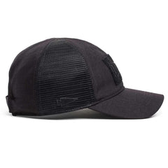 GORUCK black mesh trucker hat with spearhead logo and Velcro patch, side view