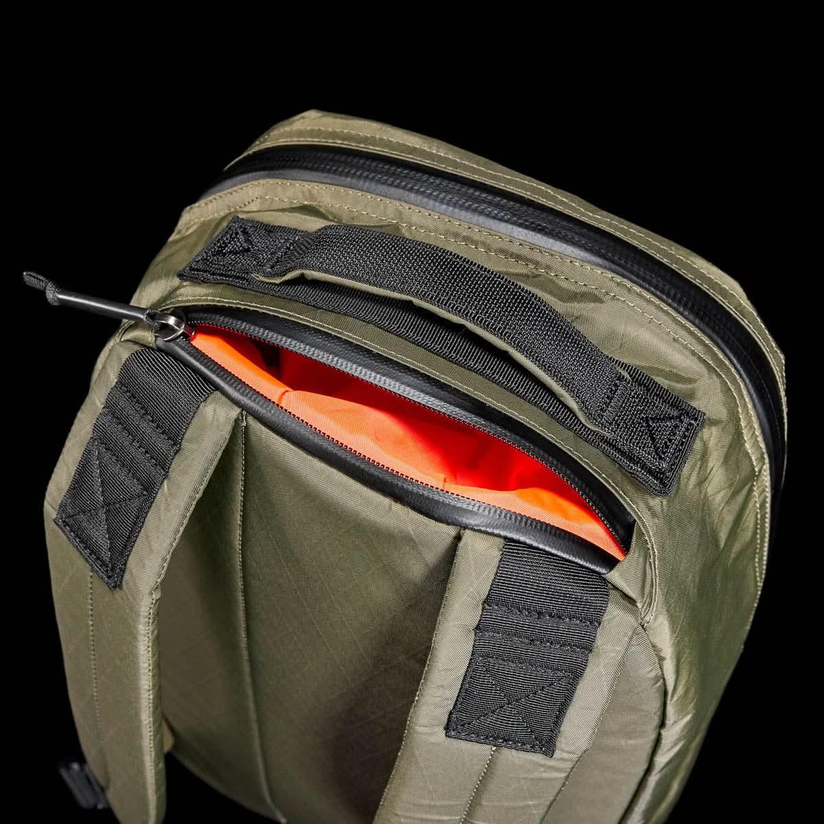 GORUCK Bullet Ruck 15L Xpac green backpack with orange interior and black handle